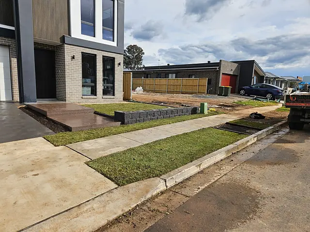 Front entry with pavers and turf