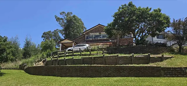 Tiered lawns held by block retaining walls